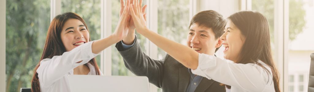 business-people-giving-high-five-celebrate-success